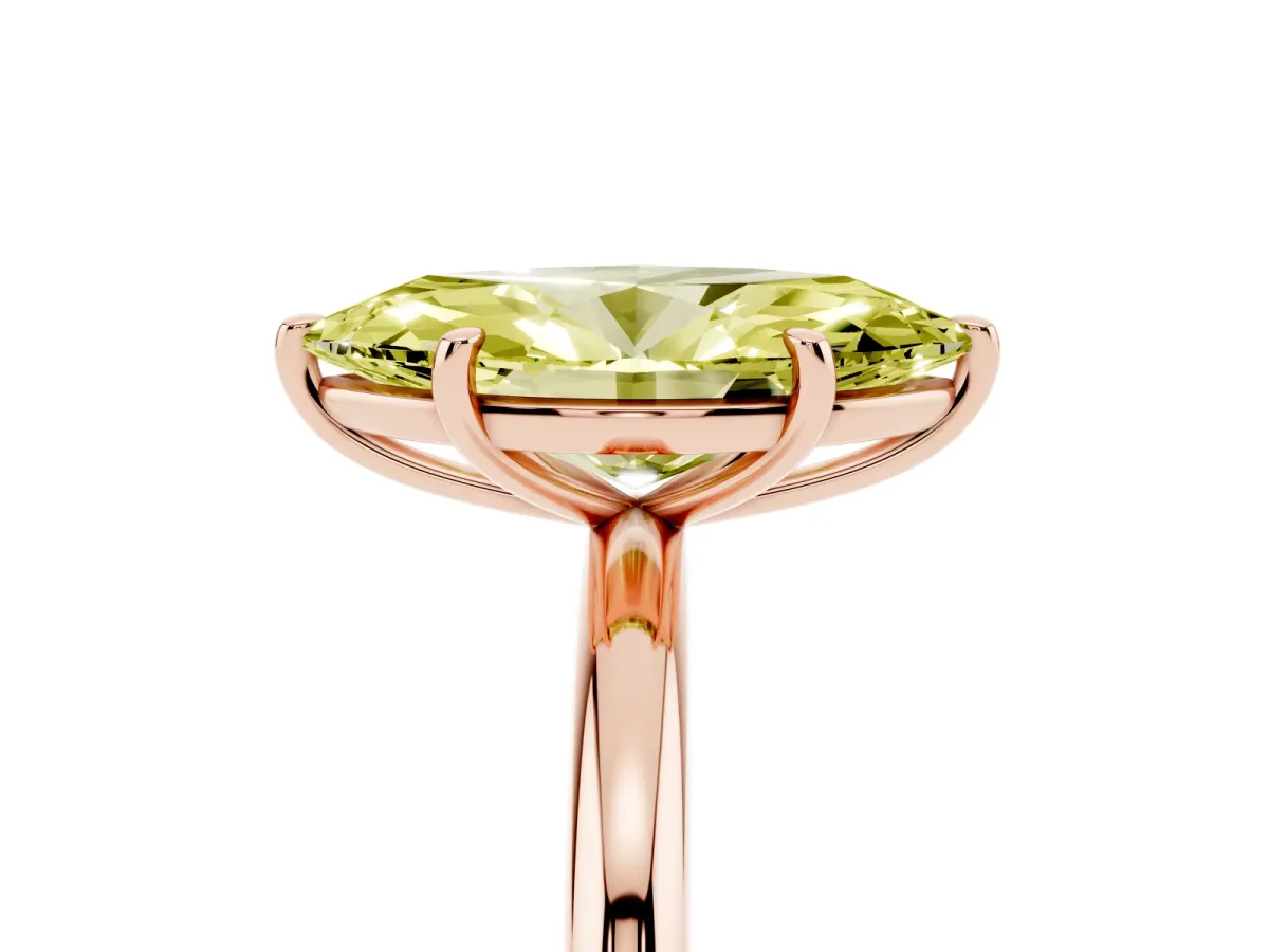 Fancy Yellow Oval Cut Solitaire Diamond Ring with Four-Prong Setting on a Plain Band Rose gold