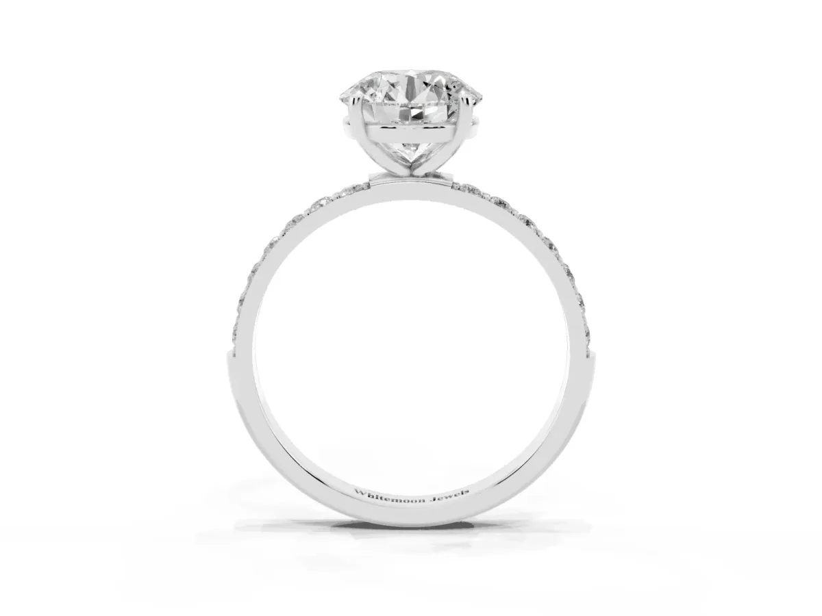 Round Cut Diamond Solitaire Ring with Round Pavé Shoulders and Prong Setting Platinum