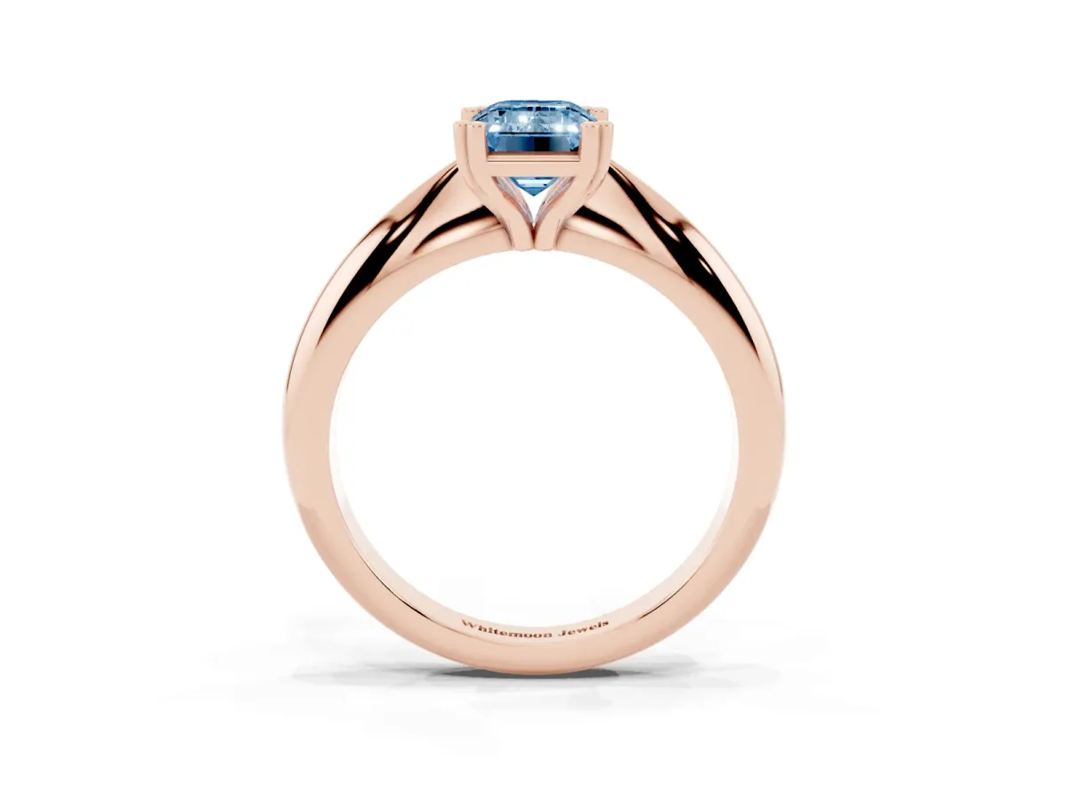 Fancy Blue Emerald Cut Cut Solitaire Engagement Ring with Tapered Band and Four-Prong Setting Rose gold