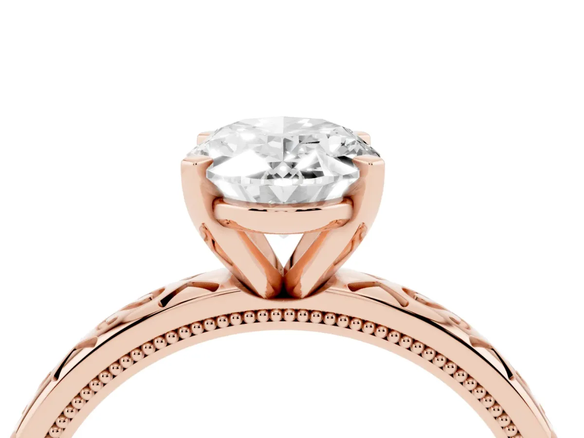 Oval Cut Solitaire Engagement Ring with Scrollwork Band and Four-Prong Setting Rose gold