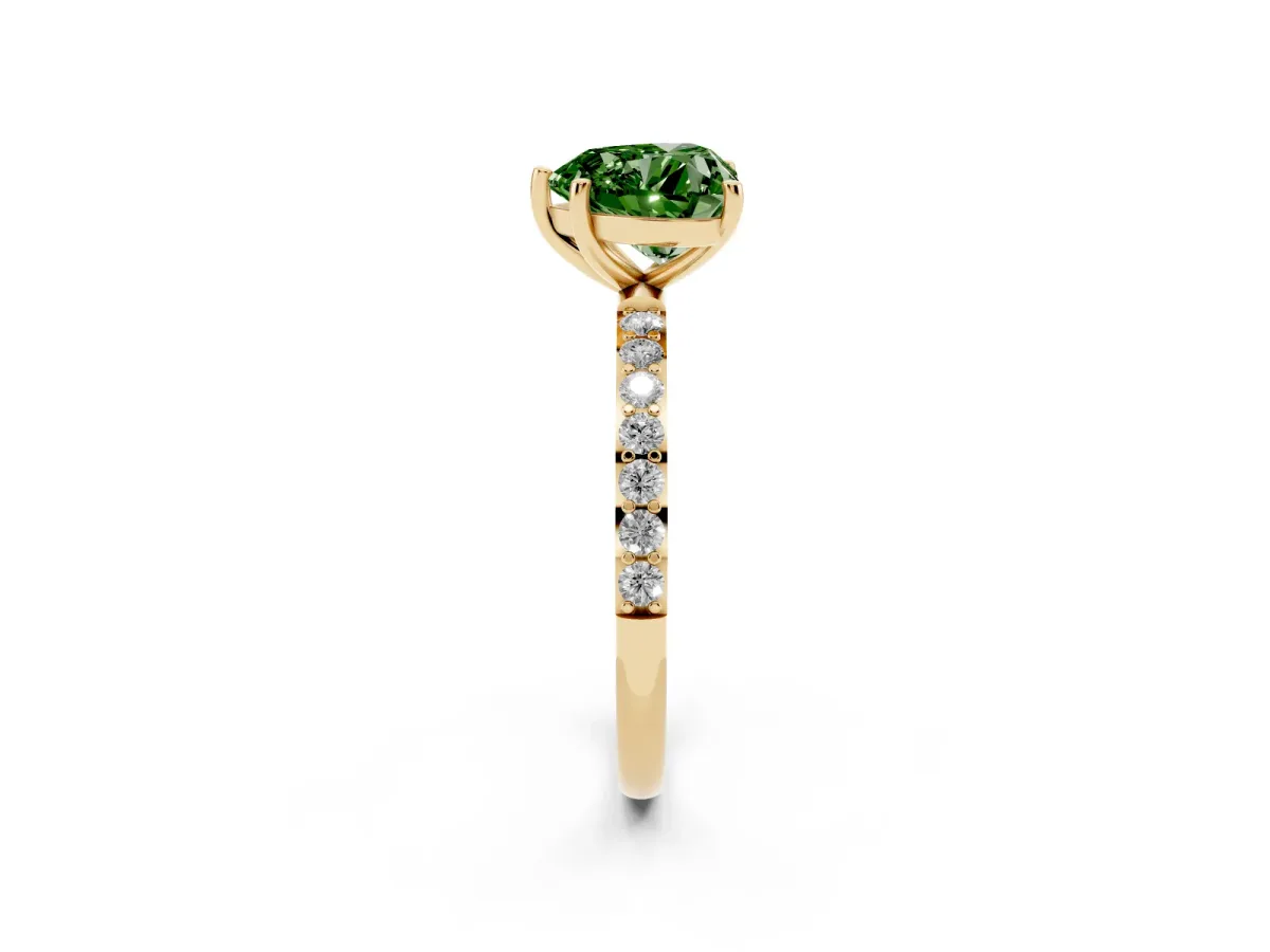 Fancy Green Heart Cut Diamond Solitaire Ring with Round Pavé Shoulders and Prong Setting Yellow gold
