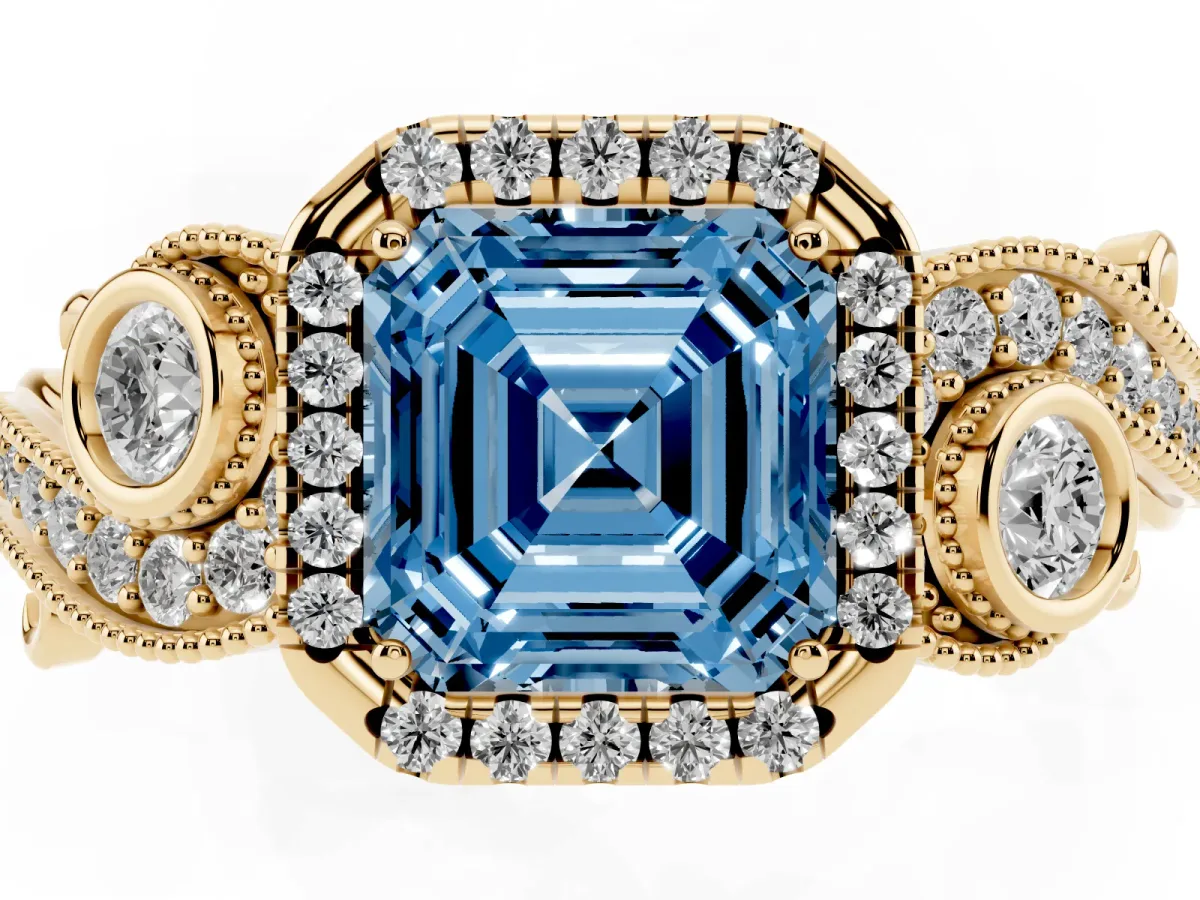 Fancy Blue Asscher Cut Halo Diamond Ring with Milgrain and Bezel Accents on a Split Shank Band Yellow gold
