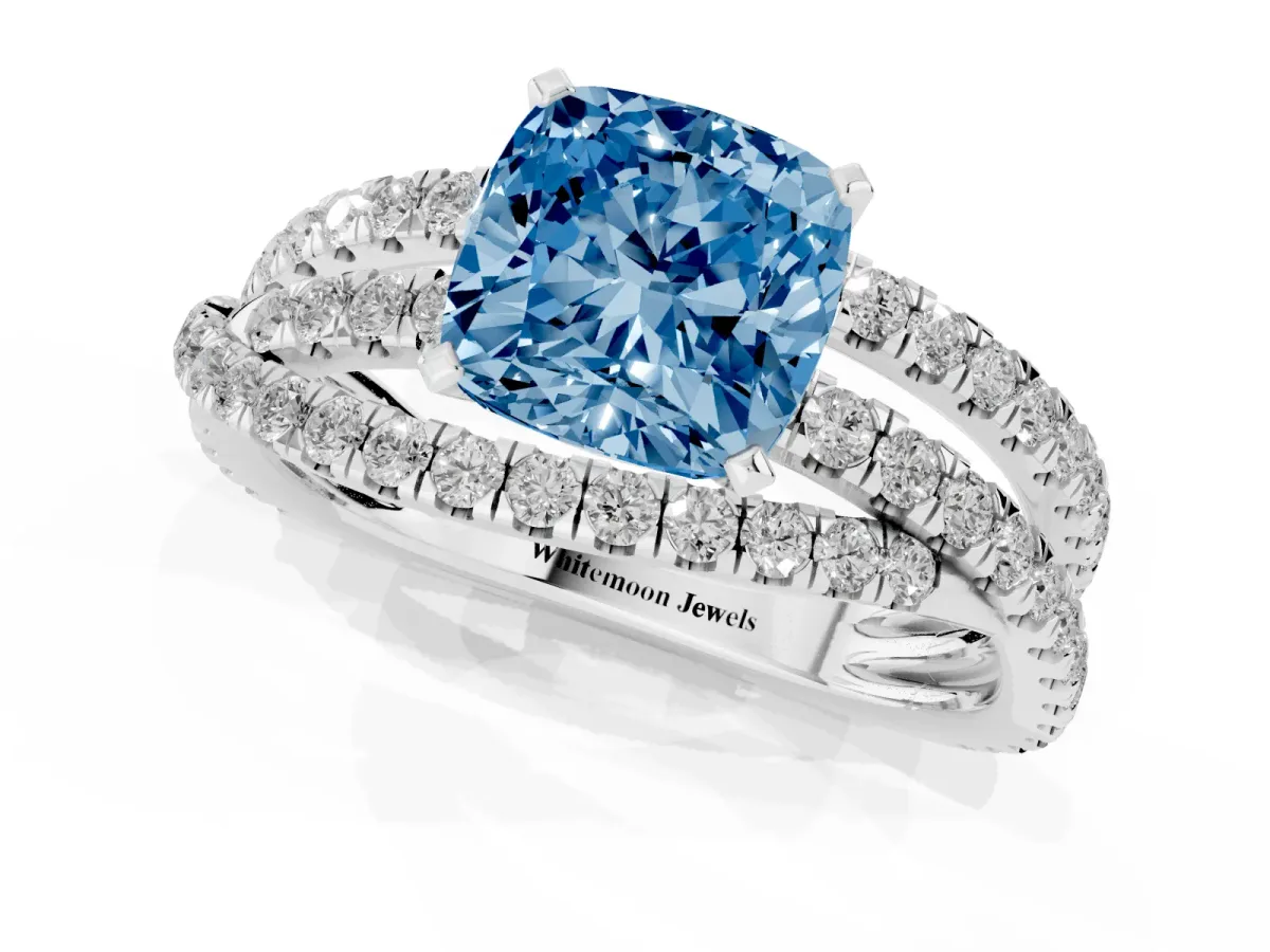 Fancy Blue Cushion Cut Solitaire Twist Band with Pavé Setting and Four-Prong Setting Silver