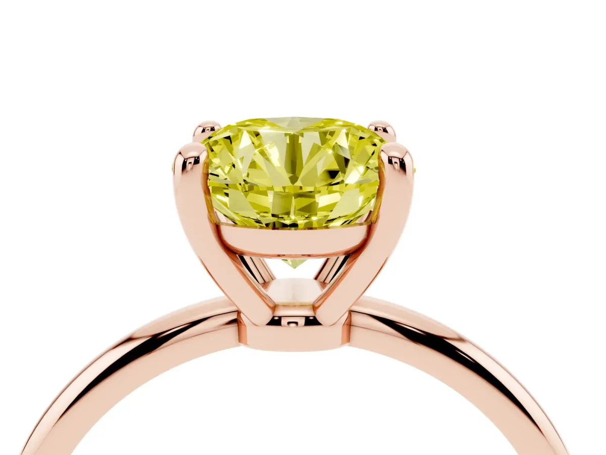 Fancy Yellow Round Cut Solitaire Diamond Ring with 4-Prong Setting on a Classic Band Rose gold