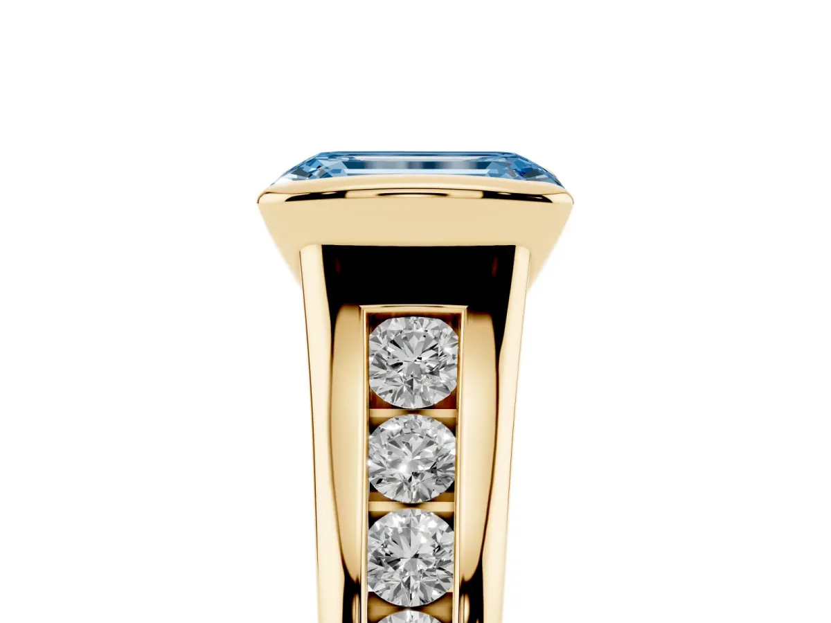 Fancy Blue Emerald Cut Solitaire Bezel-Set Diamond Ring with Channel-Set Band Yellow gold