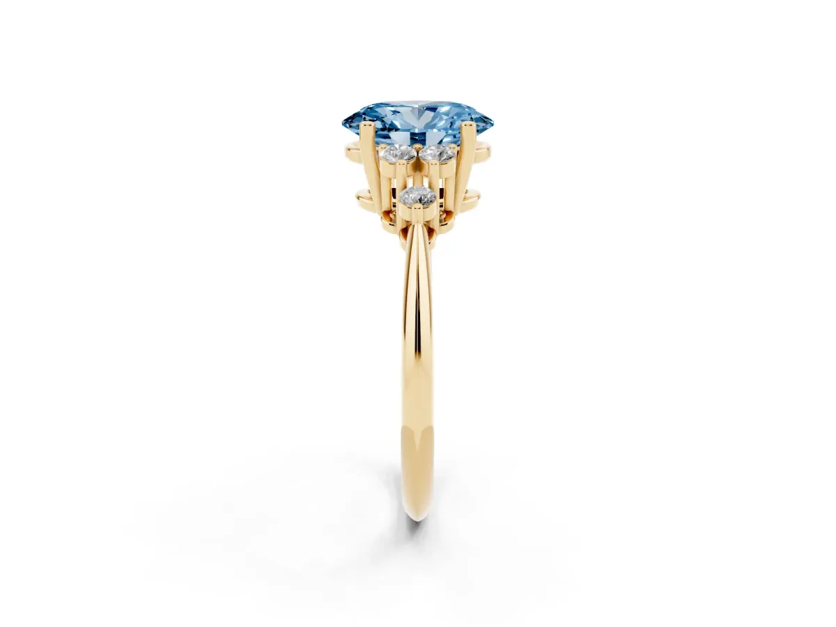 Fancy Blue Oval Cut Cut Diamond Cluster Ring with Solitaire Band and Four-Prong Setting Yellow gold