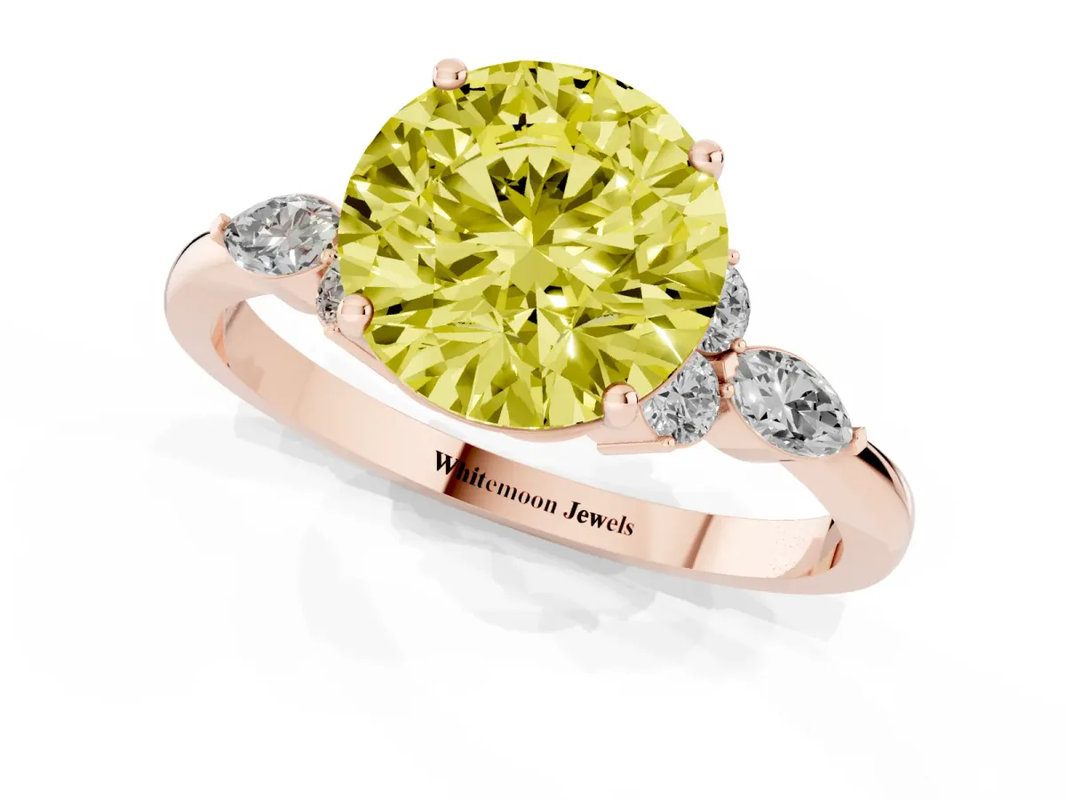 Fancy Yellow Round Cut Brilliant Diamond Solitaire Ring with Pear Side Stones and Four-Prong Setting Rose gold