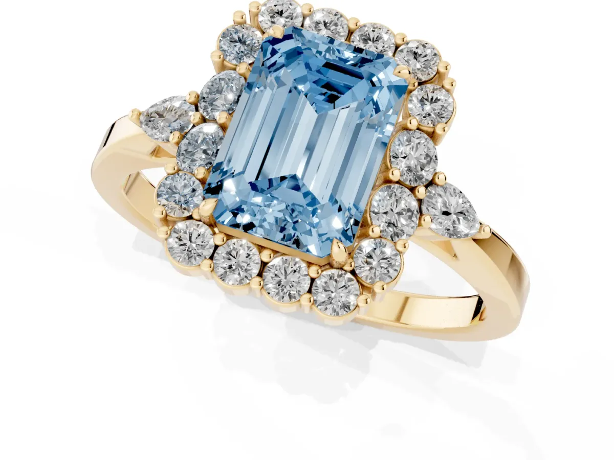 Fancy Blue Emerald Cut Diamond Halo Ring with Pear Side Stones and Prong Setting Yellow gold