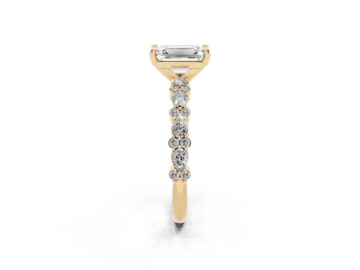 Emerald Cut Diamond Side Stone Solitaire Ring with Round and Four-Prong Setting Yellow gold