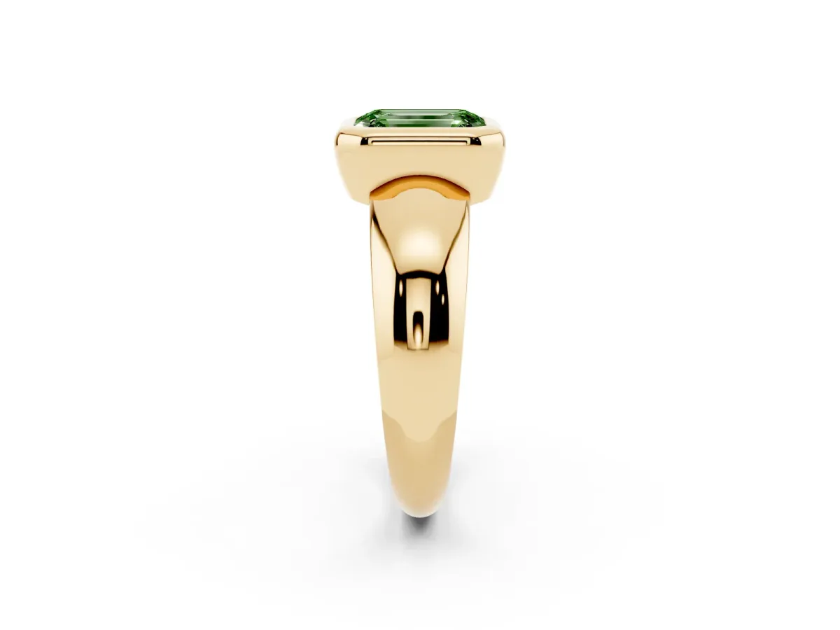 Fancy Green Bezel Set Emerald Cut Solitaire Ring with Wide Band Yellow gold