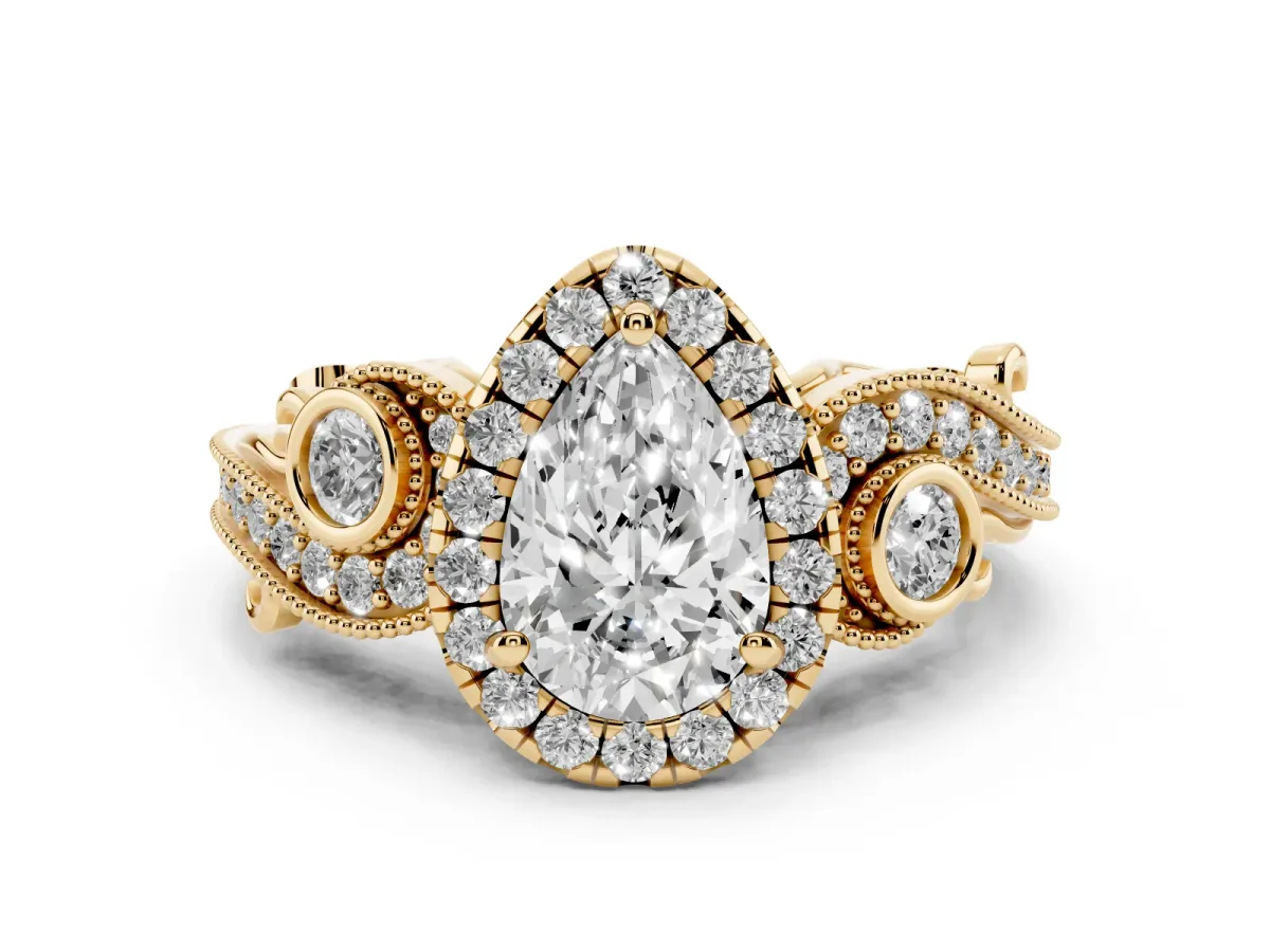 Pear Cut Diamond Halo Ring with Milgrain Pavé Band and Four-Prong Setting Yellow gold