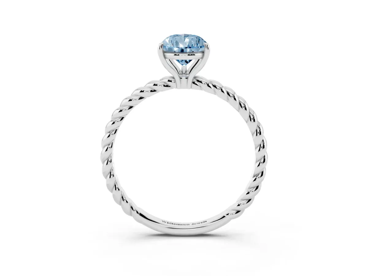 Fancy Blue Pear Cut Solitaire Twist Band Ring with Four-Prong Setting Silver