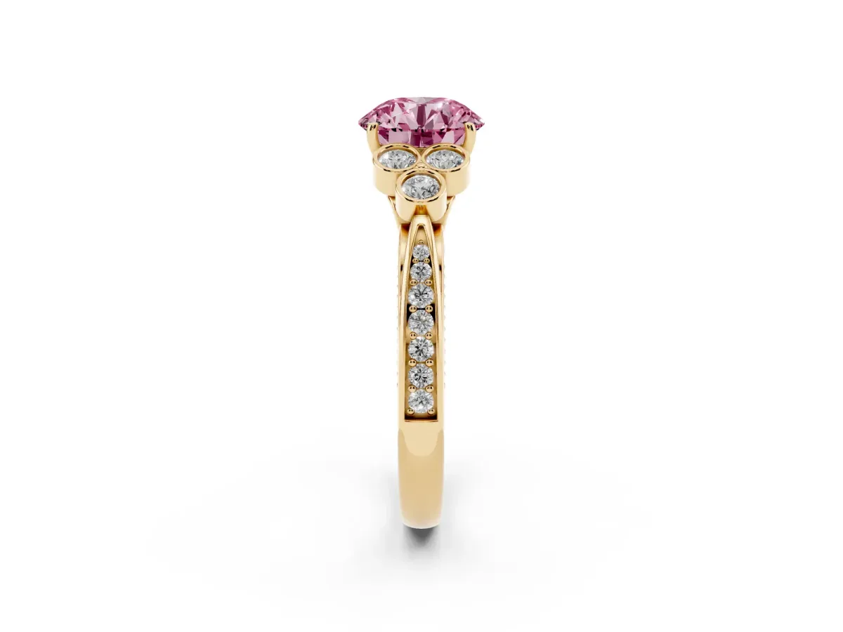 Fancy Pink Round Cut Cut Diamond Engagement Ring with Bezel Set Round Side Stones and Prong Setting Yellow gold