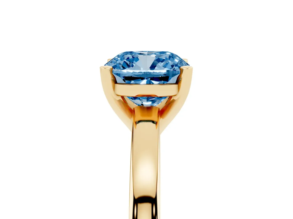 Fancy Blue Cushion Cut Solitaire Diamond Engagement Ring with Four-Prong Setting on a Classic Band Yellow gold