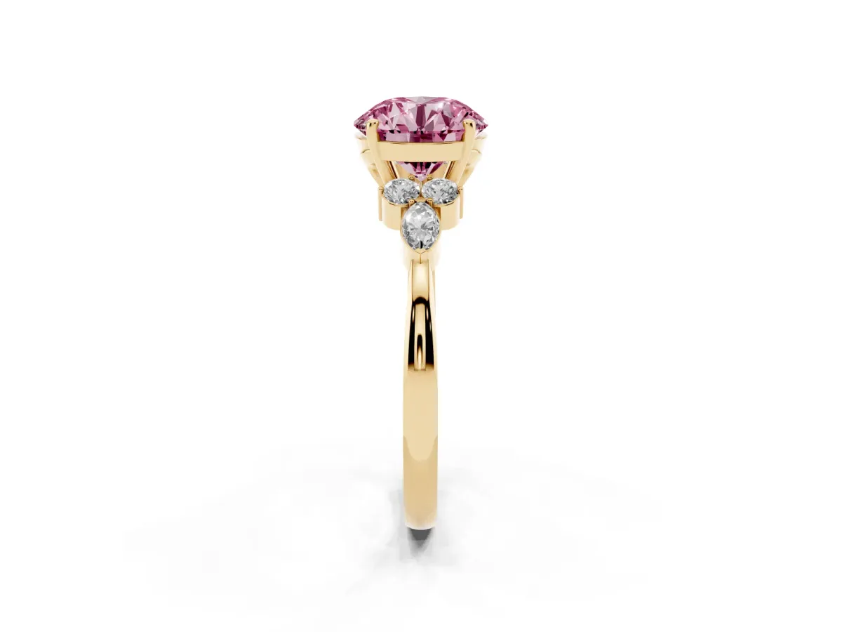 Fancy Pink Round Cut Brilliant Diamond Solitaire Ring with Pear Side Stones and Four-Prong Setting Yellow gold