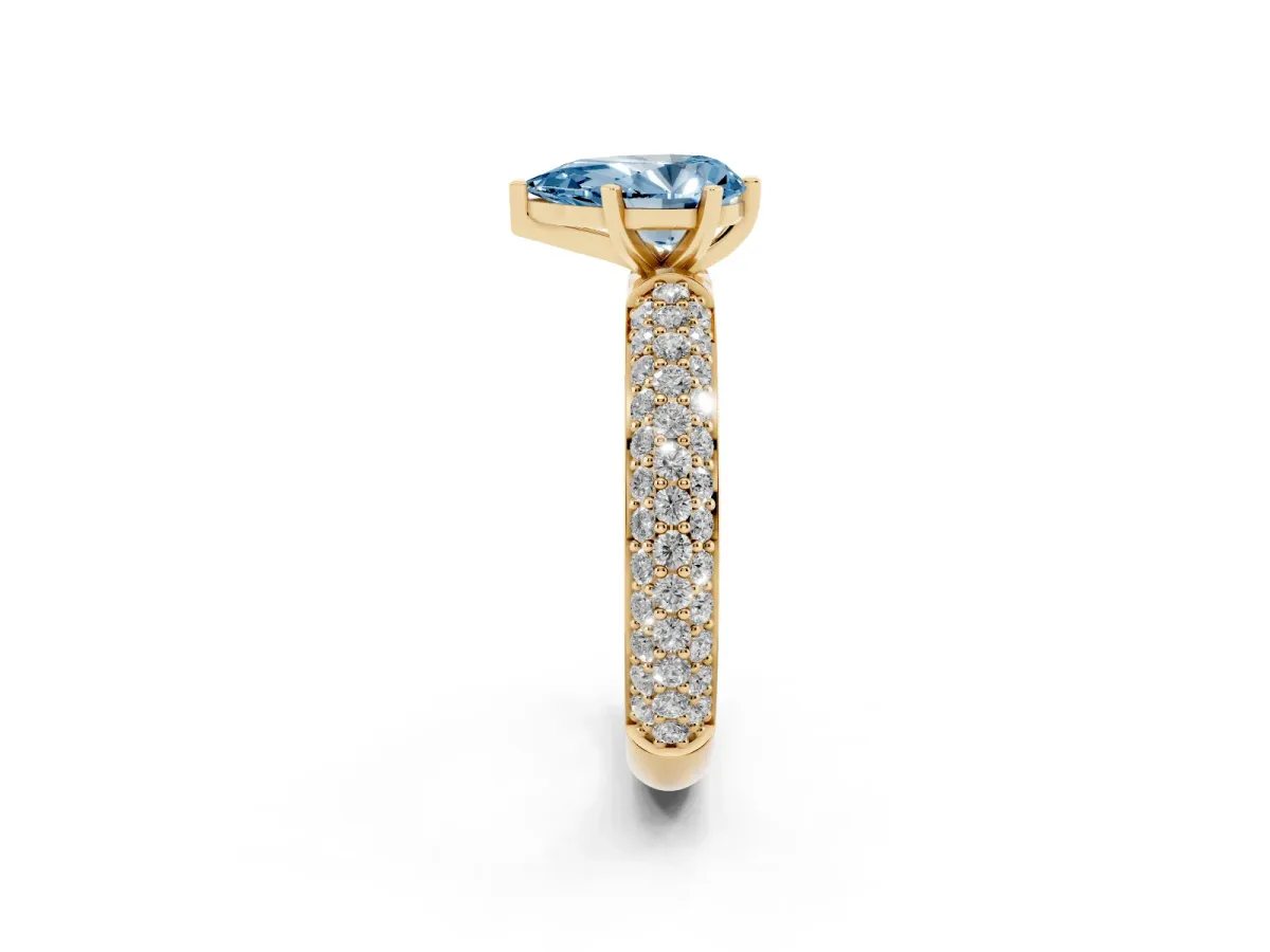 Fancy Blue Pear Cut Diamond Solitaire Ring with Prong Setting and Pavé Band Yellow gold
