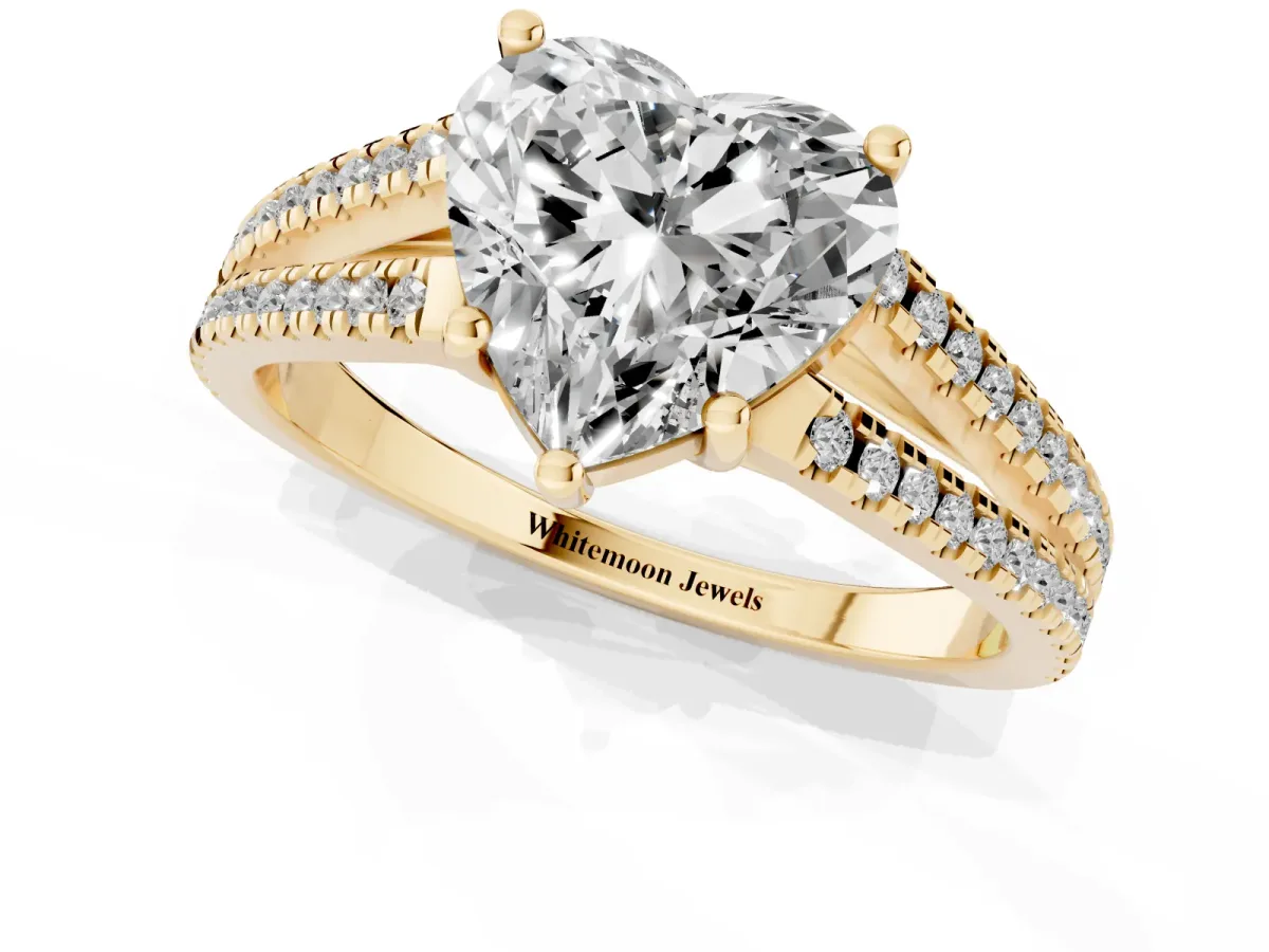 Heart Cut Diamond Solitaire Engagement Ring with Split Shank Pavé Band Yellow gold
