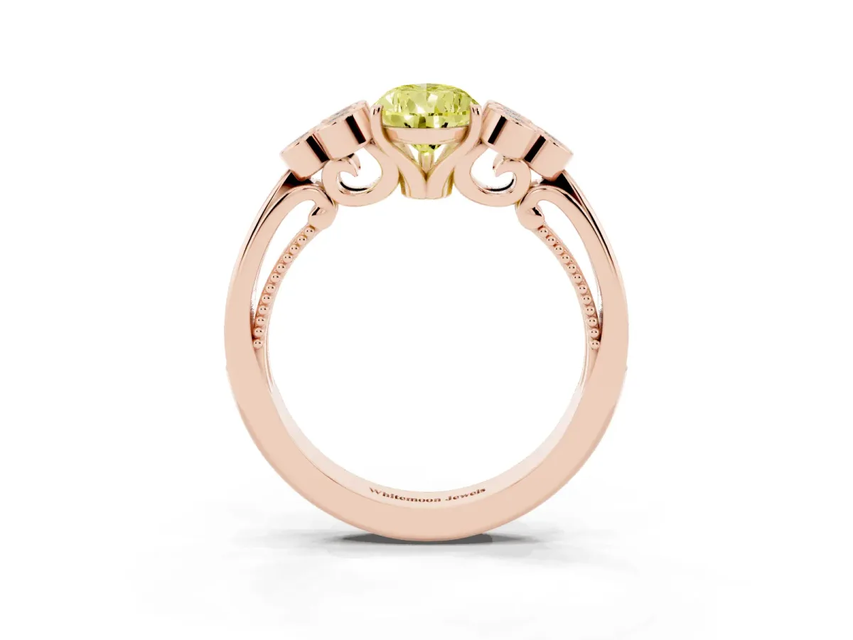 Fancy Yellow Pear Cut Cut Diamond Engagement Ring with Bezel Set Round Side Stones and Prong Setting Rose gold