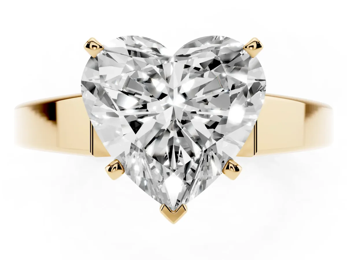 Heart Cut Solitaire Engagement Ring with Four-Prong Setting and Tapered Band Yellow gold