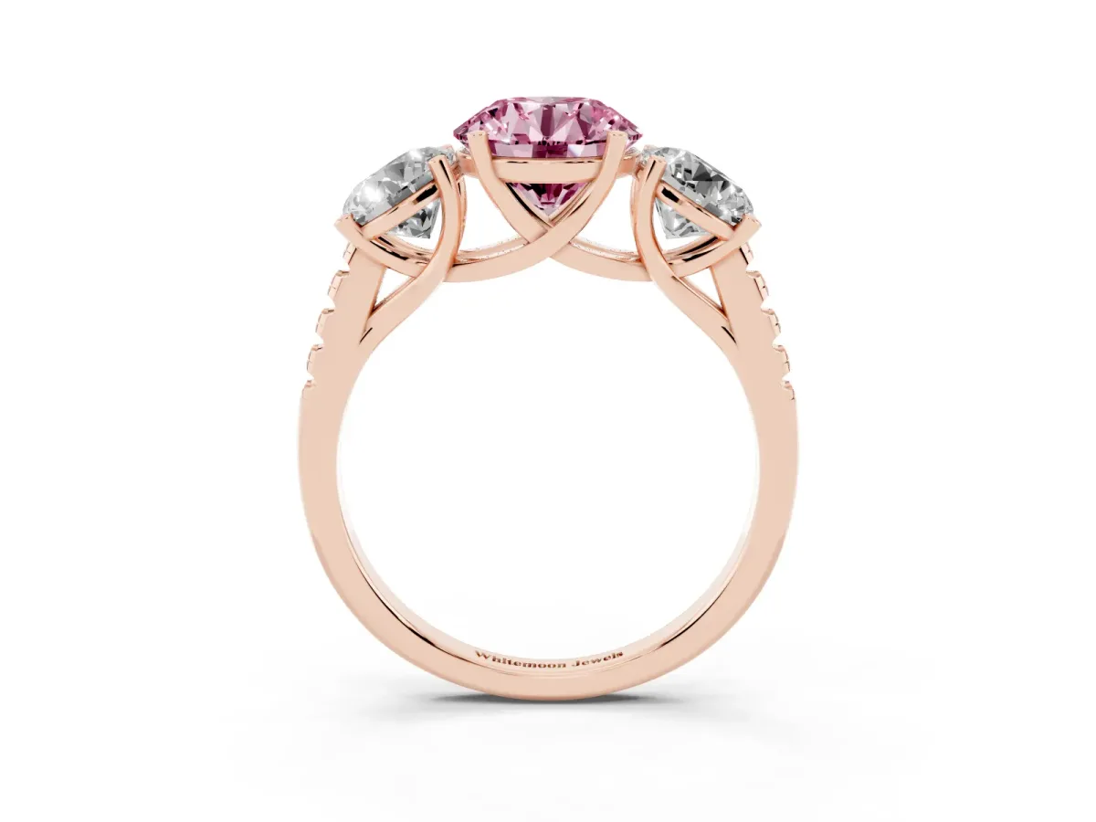 Fancy Pink Three-Stone Round Cut Diamond Ring with Round Pavé Band and Prong Setting Rose gold