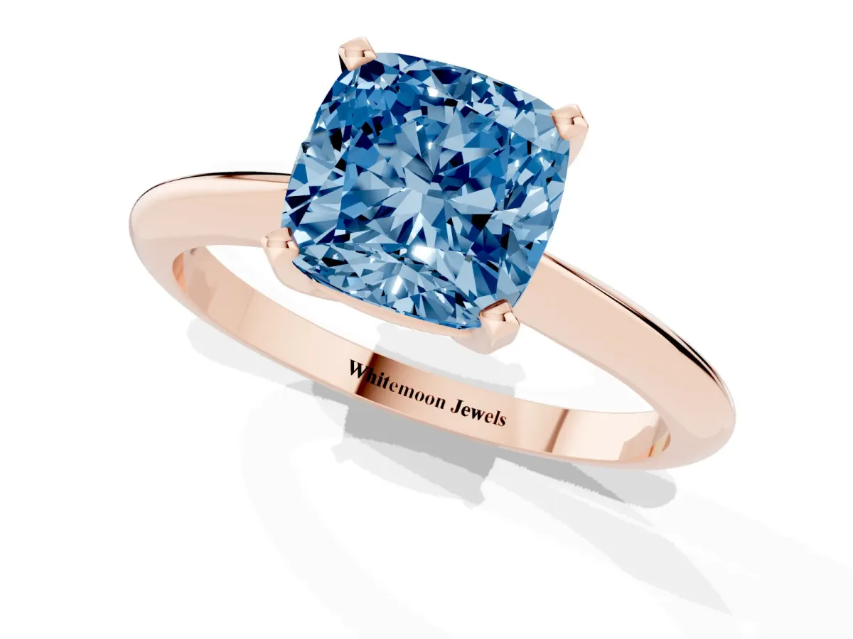 Fancy Blue Cushion Cut Cut Solitaire Ring with Four-Prong Setting on a Classic Band Rose gold