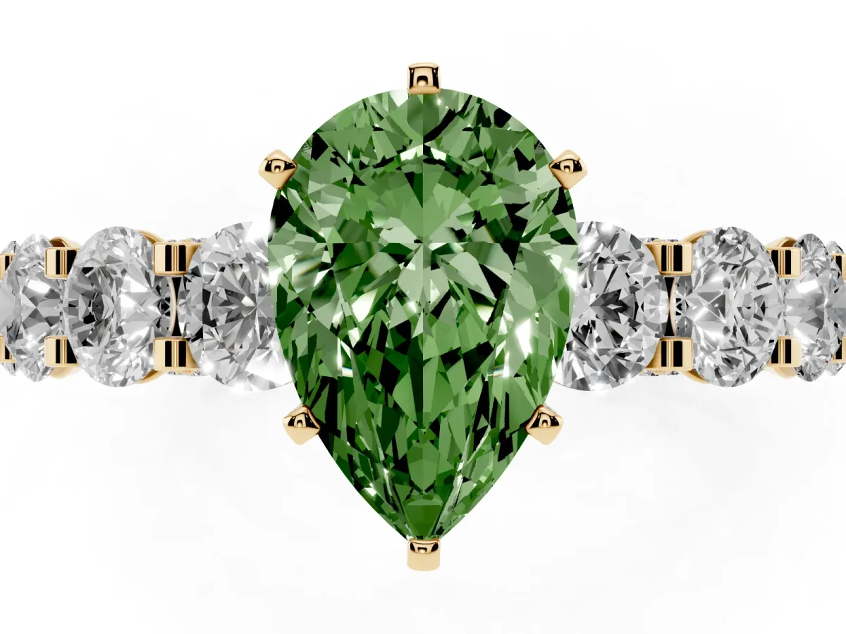 Fancy Green Pear Cut Diamond Side Stone Engagement Ring with Four-Prong Setting Yellow gold