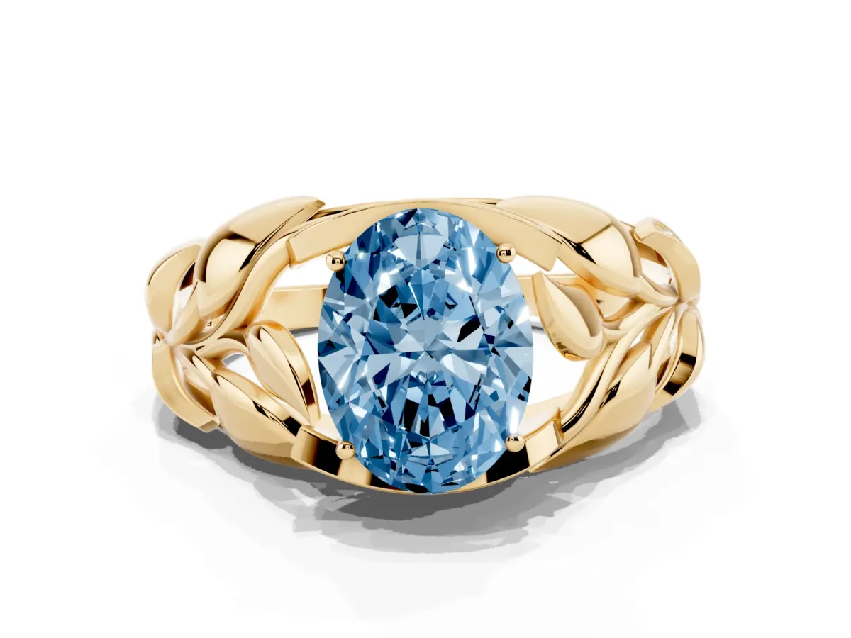 Fancy Blue Oval Cut Diamond Leaf-Inspired Engagement Ring with Round Accents and Prong Setting Yellow gold