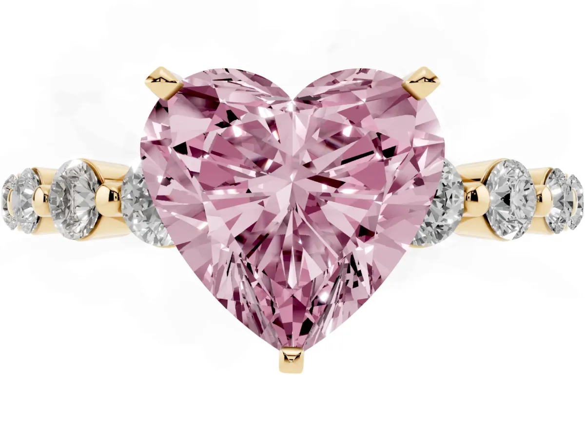 Fancy Pink Heart Cut Solitaire Diamond Ring with Pave Band and Four-Prong Setting Yellow gold