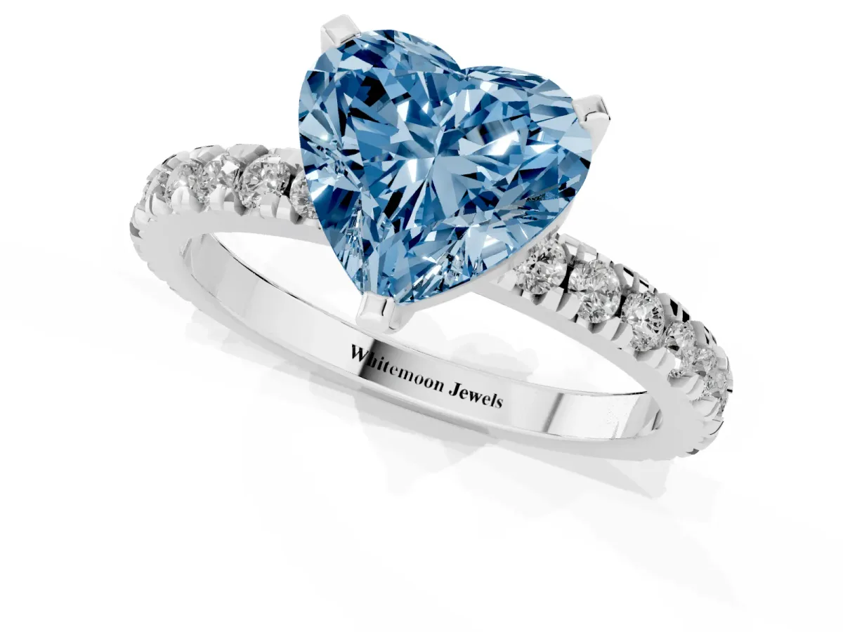 Fancy Blue Heart Cut Diamond Pavé Band Solitaire with Four-Prong Setting Silver