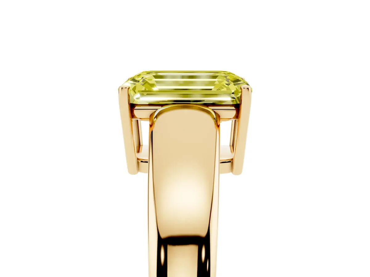 Fancy Yellow Emerald Cut Solitaire Diamond Ring with Tapered Band and Four-Prong Setting Yellow gold