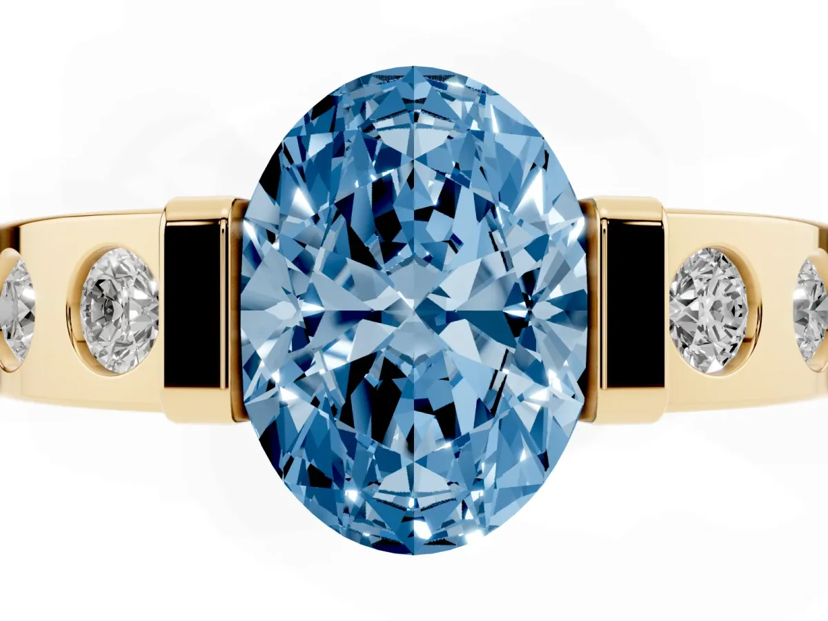 Fancy Blue Oval Cut Brilliant Channel-Set Diamond Ring with Bezel Prong Setting Yellow gold