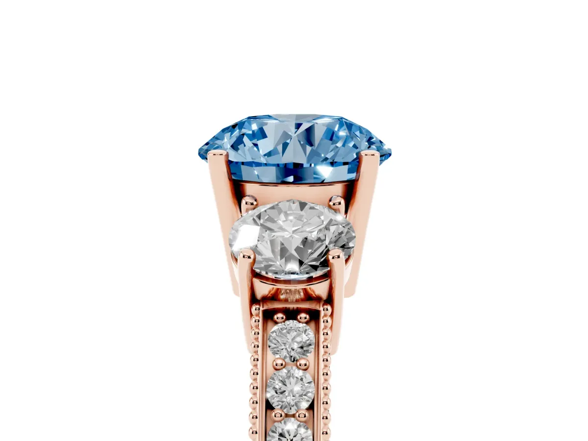 Fancy Blue Round Cut Three-Stone Diamond Ring with Pavé Band and Four-Prong Setting Rose gold