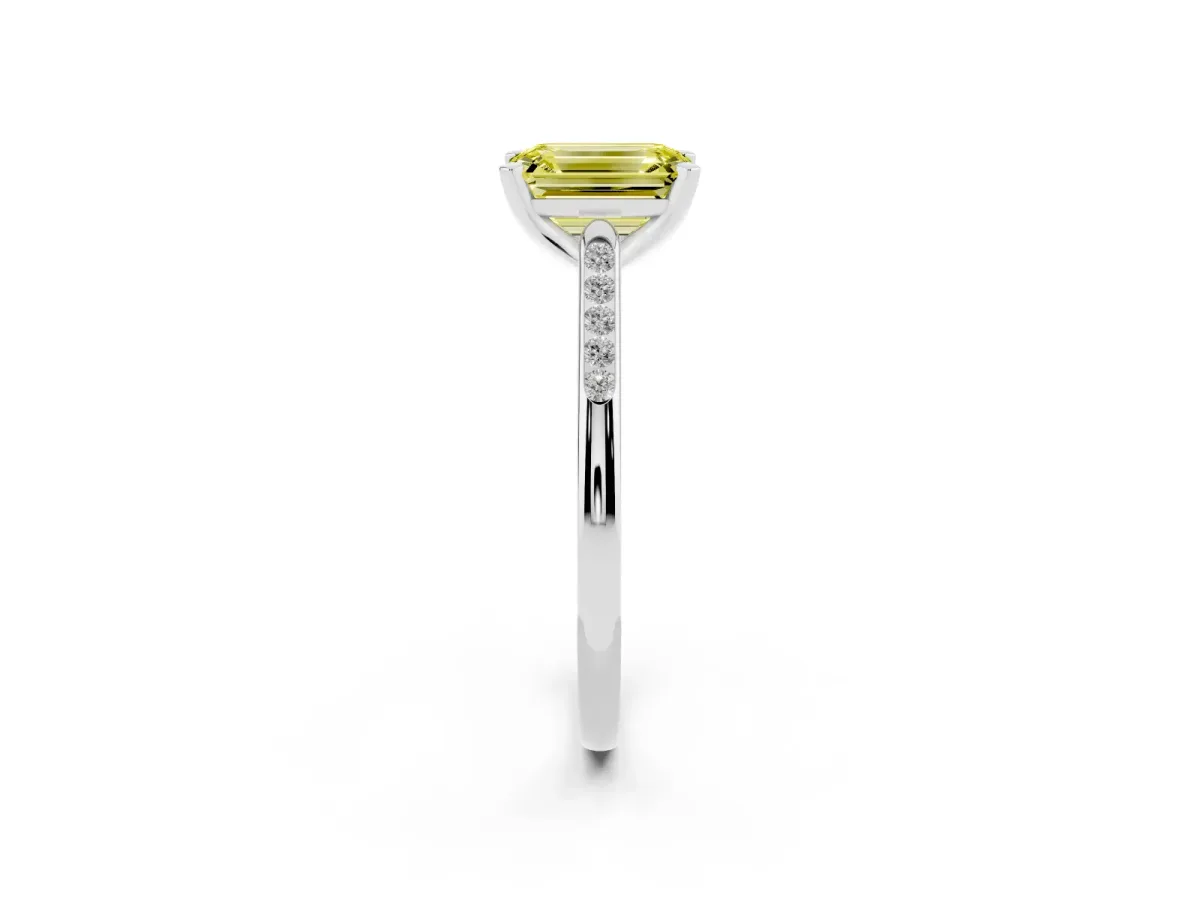 Fancy Yellow Emerald Cut Diamond Solitaire Ring with Channel Set Round Band and Prong Setting Silver
