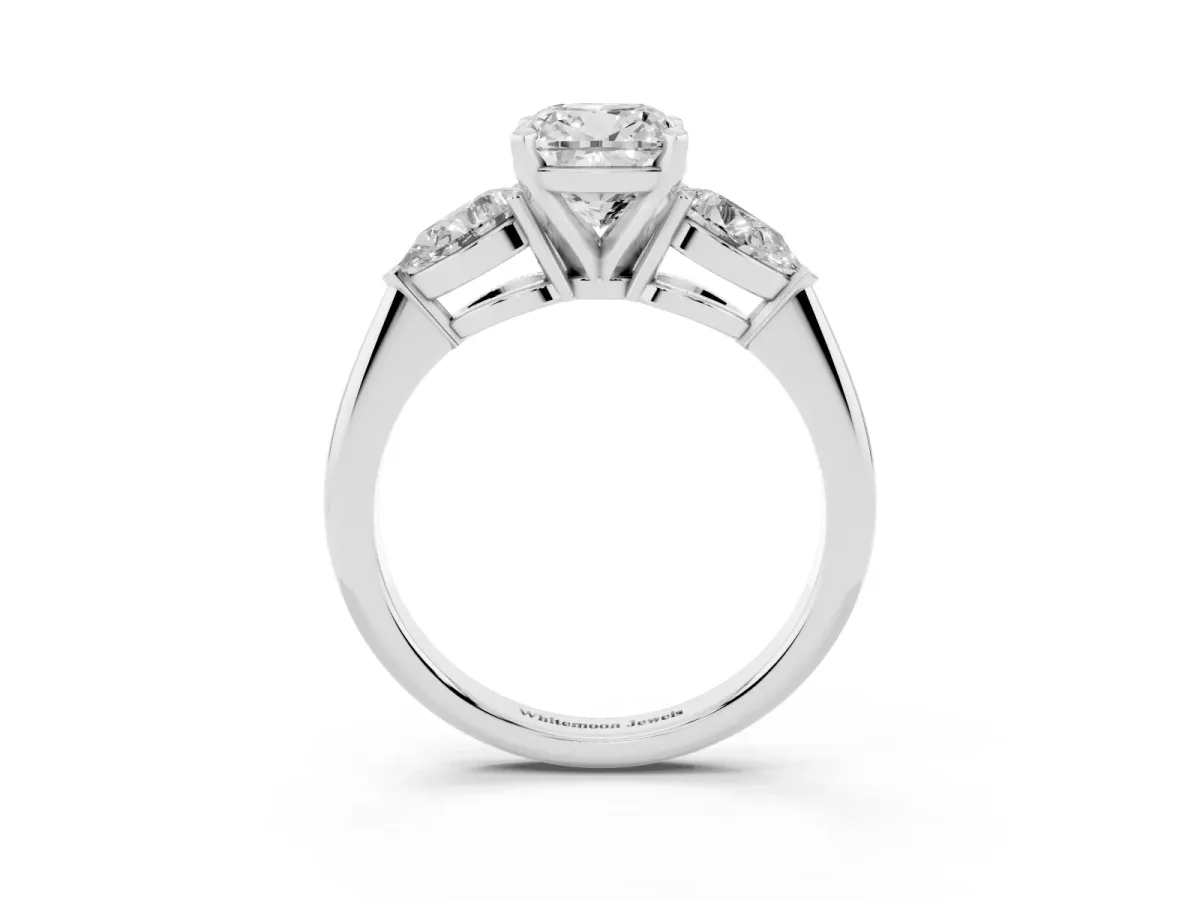 Three-Stone Cushion Cut Diamond Ring with Pear Side Stones and Four-Prong Setting Platinum