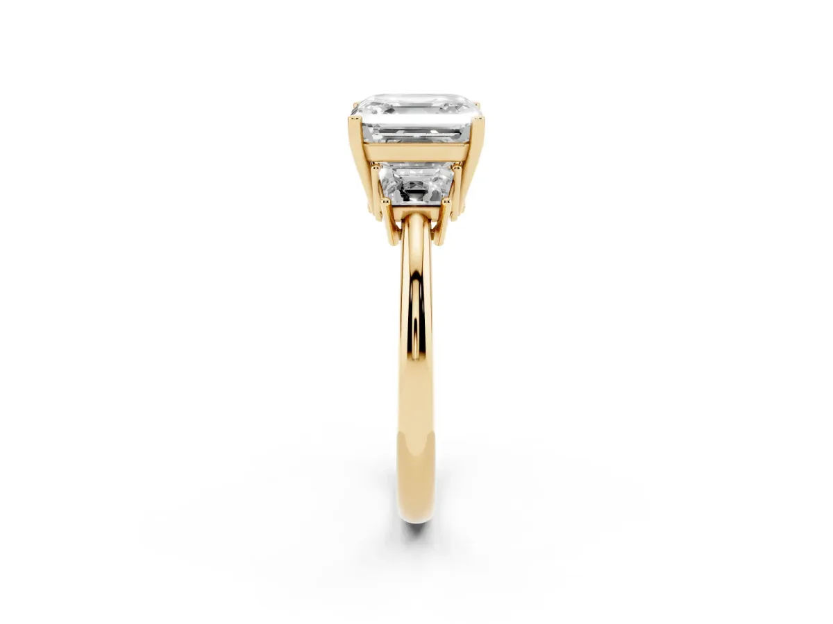 Asscher Cut Diamond Three-Stone Ring with Trapezoid Side Stones and Prong Setting Yellow gold