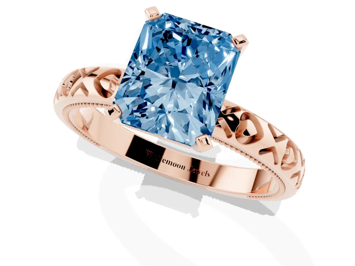 Fancy Blue Radiant Cut Solitaire Diamond Engagement Ring with XO Engraved Band and Four-Prong Setting Rose gold