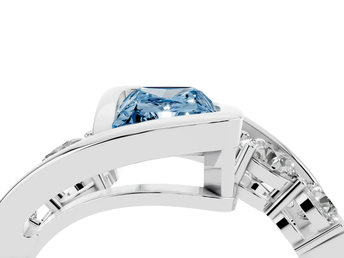Fancy Blue Bezel Set Radiant Cut Diamond Bypass Ring with Round Accents Silver