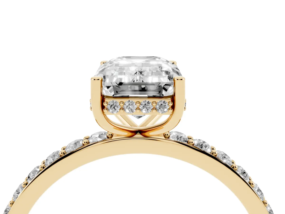 Emerald Cut Diamond Solitaire Ring with Pavé Band and Hidden Halo Yellow gold
