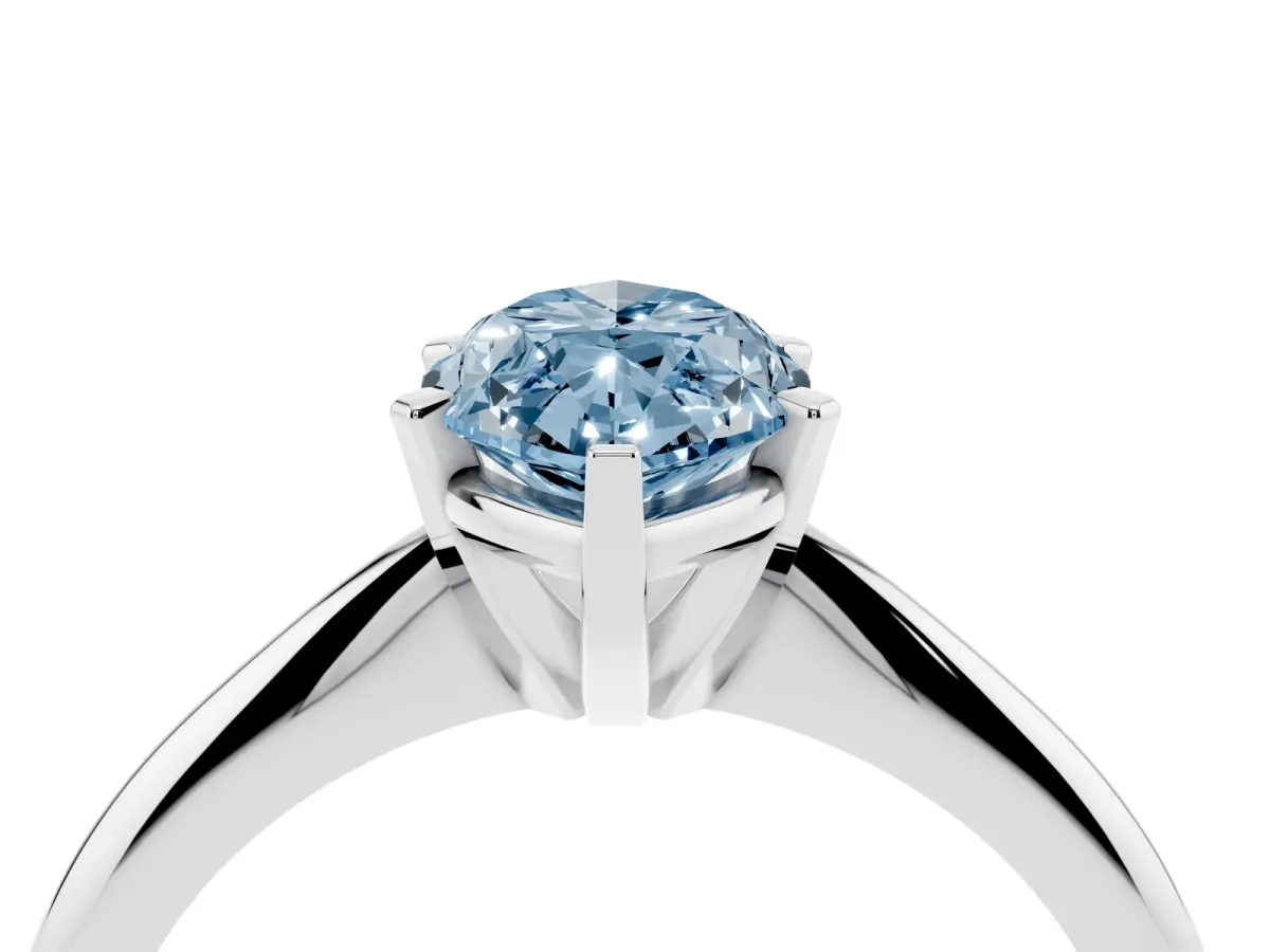 Fancy Blue Marquise Cut Cut Solitaire Ring with Four-Prong Setting on a Classic Band Silver