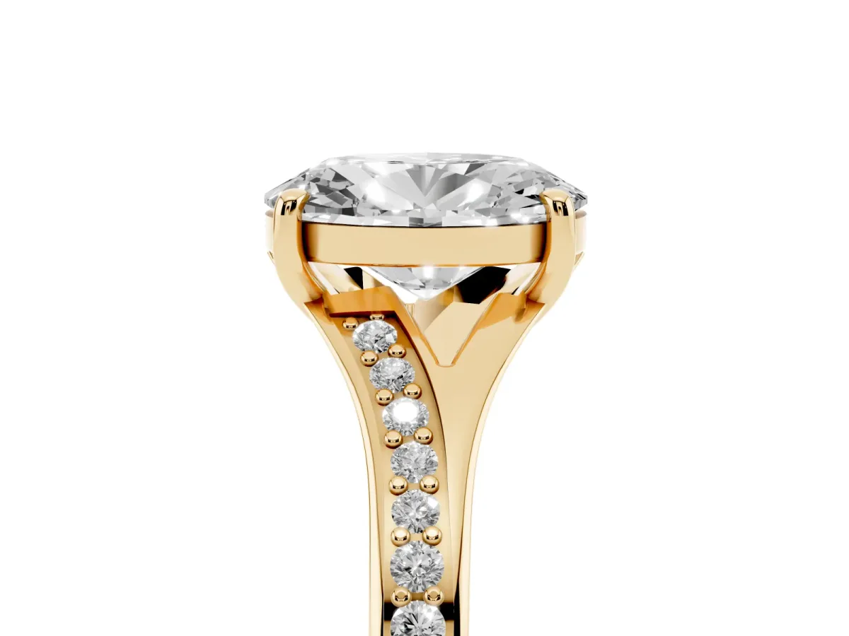 Oval Cut Diamond Solitaire Ring with Pavé Band and Prong Setting Yellow gold