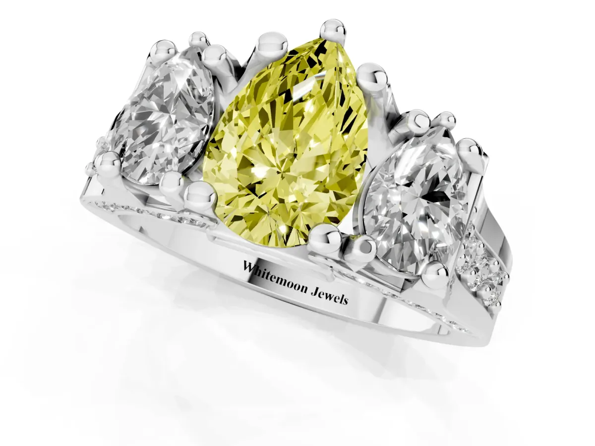Fancy Yellow Pear Cut Diamond Three-Stone Ring with Channel Set Band and Four-Prong Setting Silver