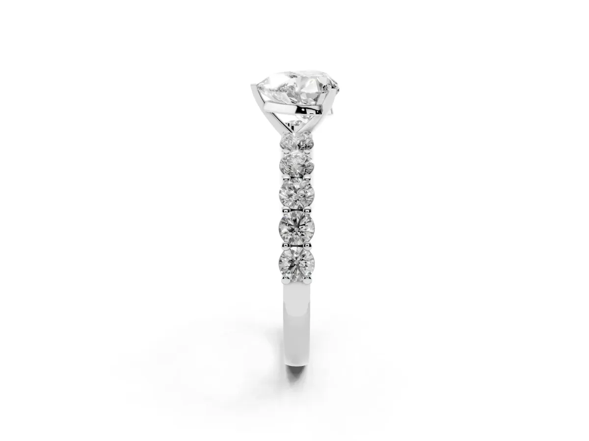 Heart Cut Diamond Solitaire Ring with Shared Prong Round Side Stones Silver
