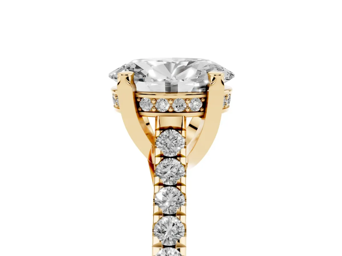 Oval Cut Brilliant Diamond Solitaire with Pavé Band and Four-Prong Setting Yellow gold