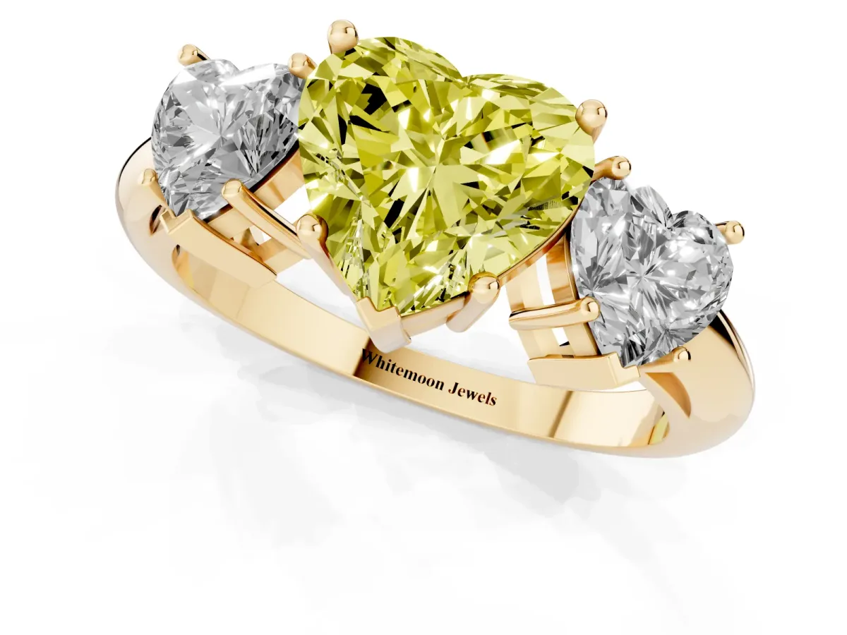 Fancy Yellow Three-Stone Heart Cut Cut Diamond Engagement Ring with Prong Setting on a White Gold Band Yellow gold