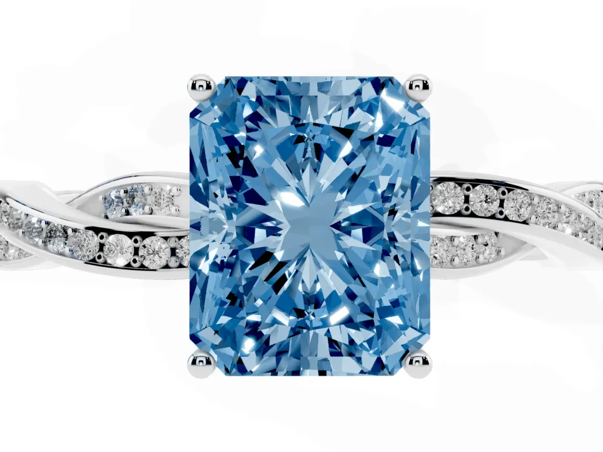 Fancy Blue Radiant Cut Solitaire Twisted Pave Diamond Ring with Four-Prong Setting Silver