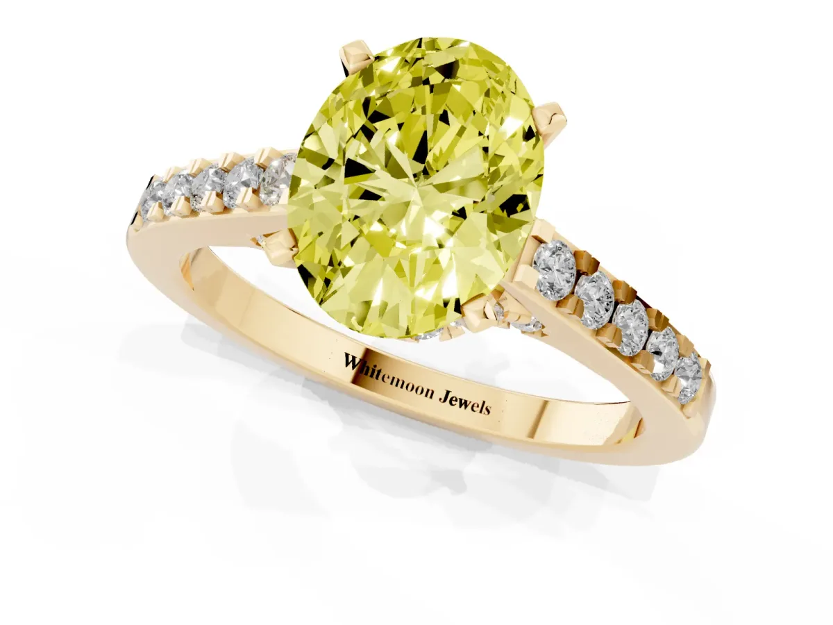 Fancy Yellow Oval Cut Diamond Solitaire Ring with Crossover Gallery and Round Pavé Band Yellow gold