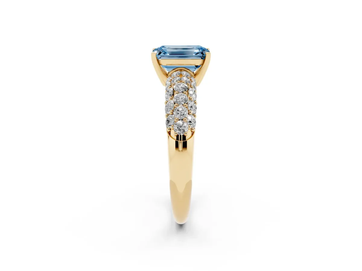 Fancy Blue Emerald Cut Diamond Pavé Band Solitaire Ring with Four-Prong Setting Yellow gold