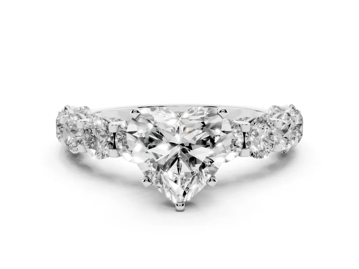 Heart Cut Diamond Side Stone Engagement Ring with Four-Prong Setting Silver