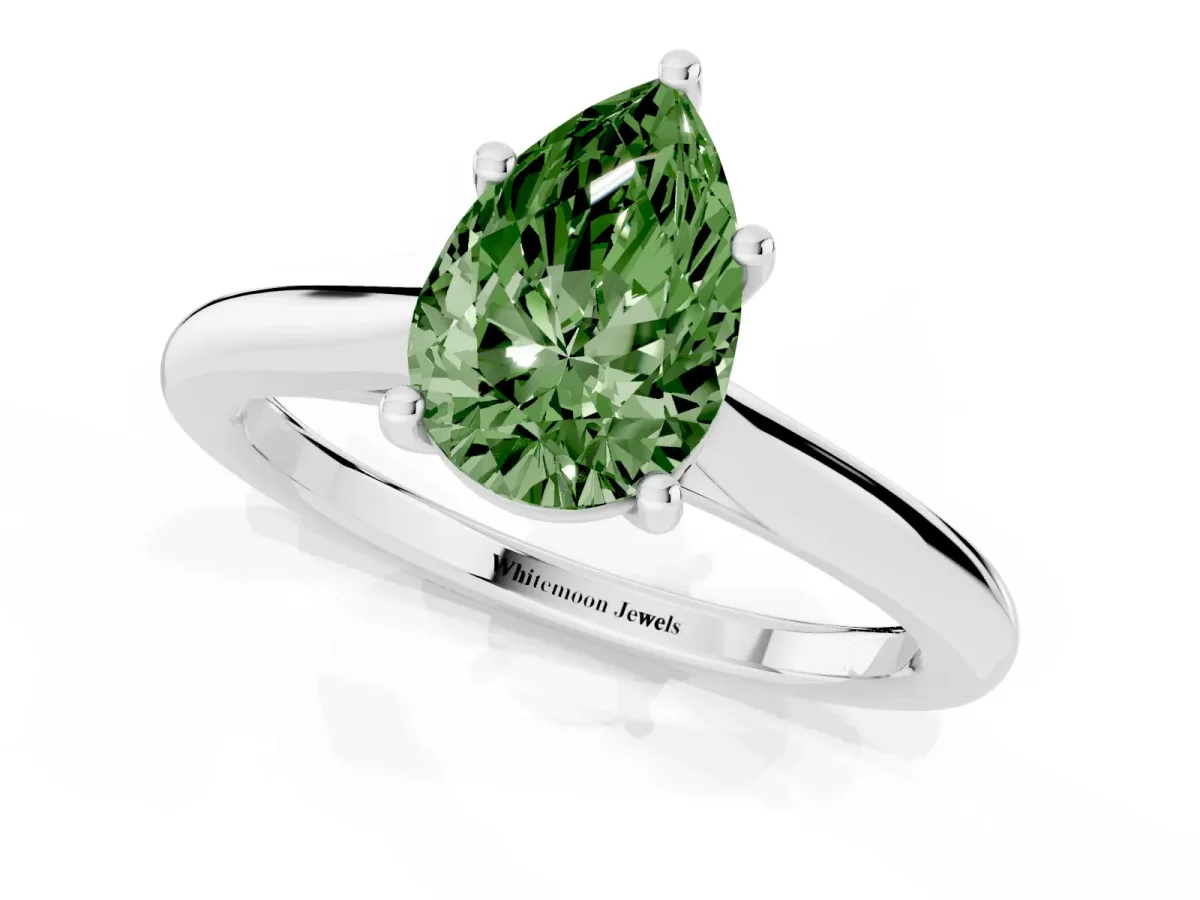 Fancy Green Pear Cut Cut Solitaire Ring with Cathedral Band and Four-Prong Setting Silver