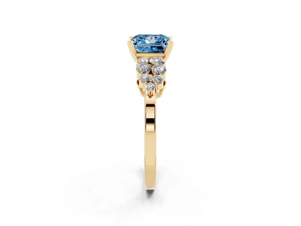 Fancy Blue Princess Cut Cluster Diamond Engagement Ring with Pavé Band and Four-Prong Setting Yellow gold